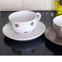 Cup And Saucer- White With Brown Spots