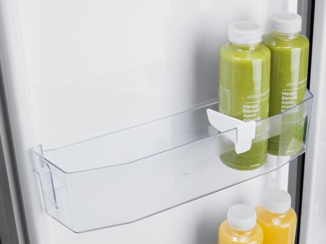 The sliding bottle retainer of the Thetford N3000 series fridges keeps bottles in place whilst you are in transit.