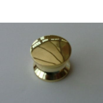 Push button gold for standard rim lock